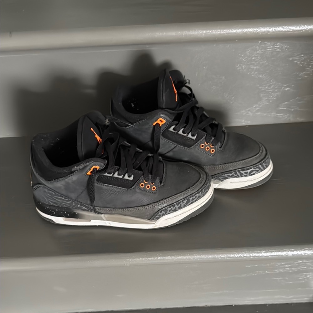 Jordan Black and Orange Sneakers with Classic Air Design